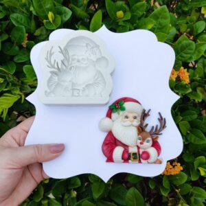 Papai Noel com cervo