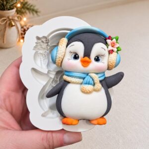 Pinguin fofinho de fone natalino